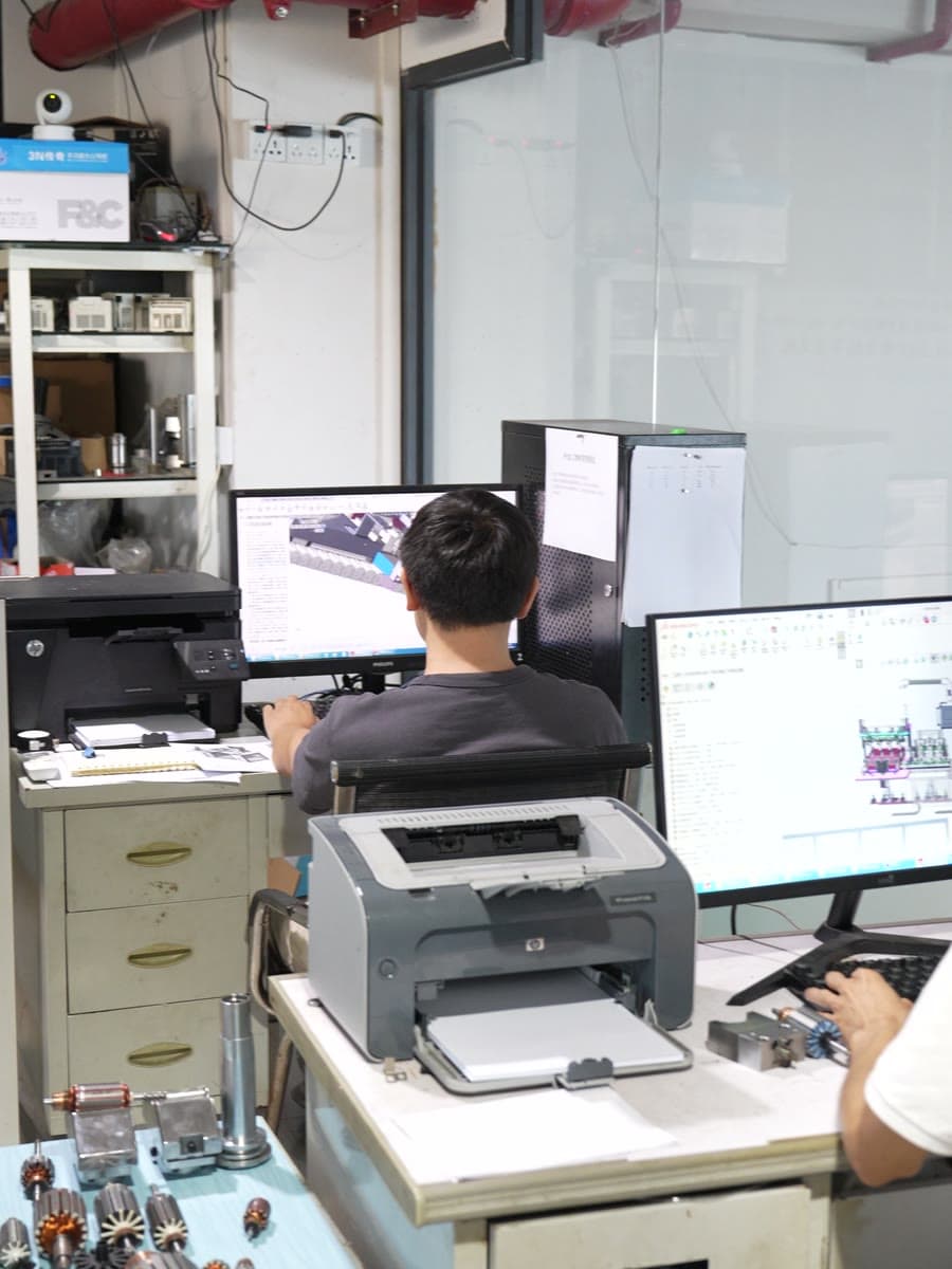An engineer designing tooling in CAD