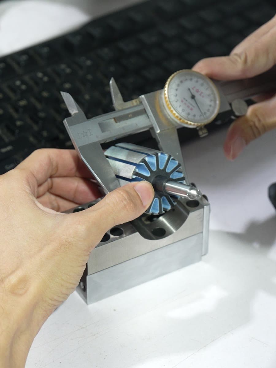 Measuring a part with a dial caliper
